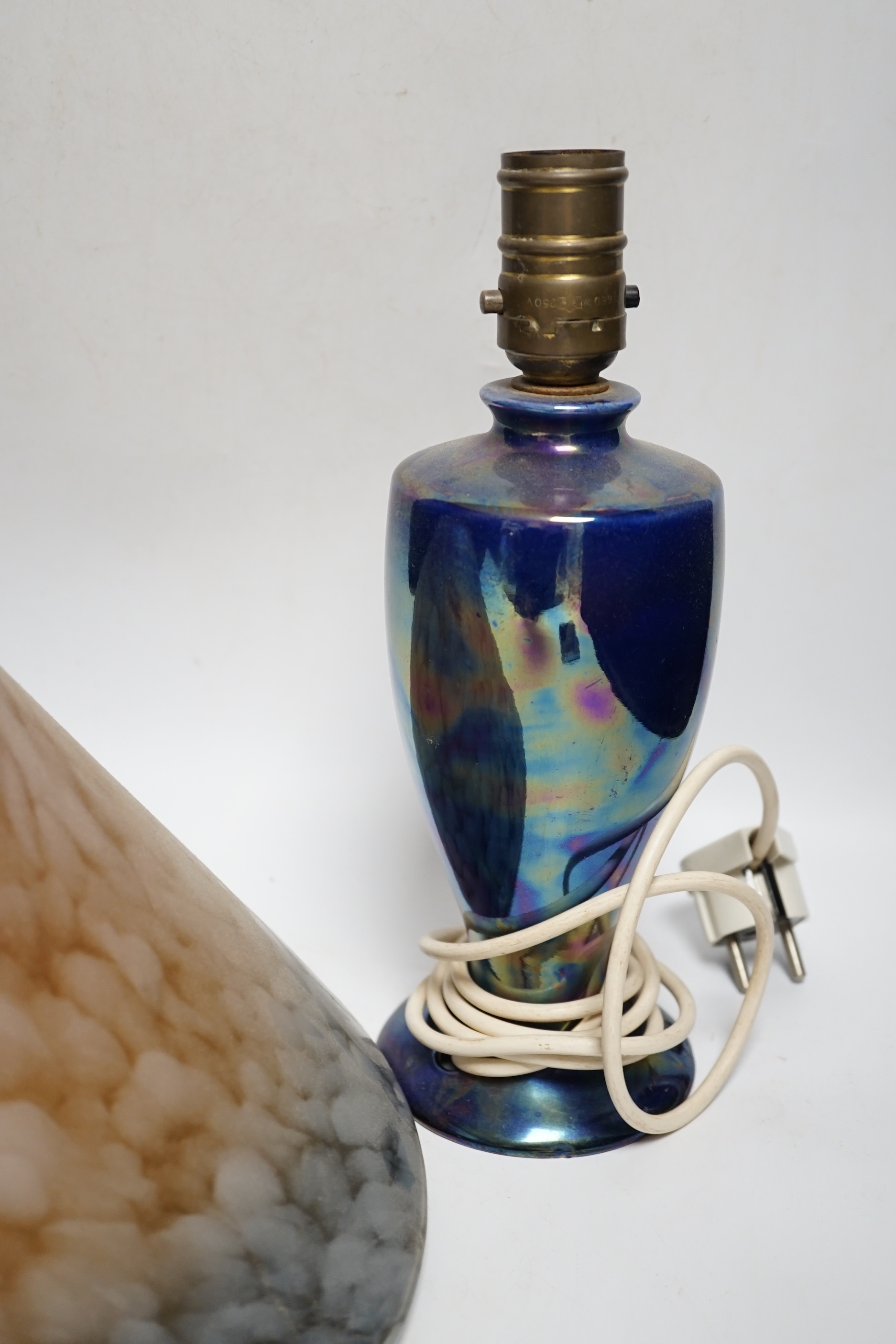 Two coloured glass shades and a lustre table lamp, shades 34cm diameter